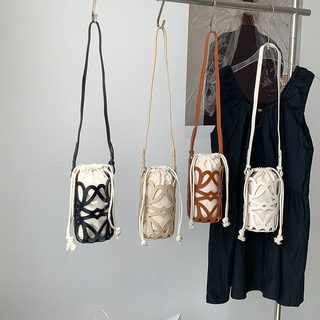 여성 가방 니치 디자인 펀칭 버킷백 PU 숄더 크로스백 데일리 코디백