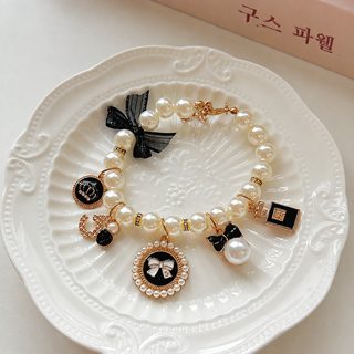 狗狗珍珠项链配饰项圈雪纳瑞泰迪拍照百搭网红蝴蝶结吊坠宠物用品