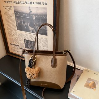 한국판 충돌색 백합 휴대용 토트백 여자 2026 신형 숄더 여자 가방 심플하고